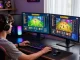 Player immersed in a koitoto gaming session with vibrant slot graphics and gaming setup.